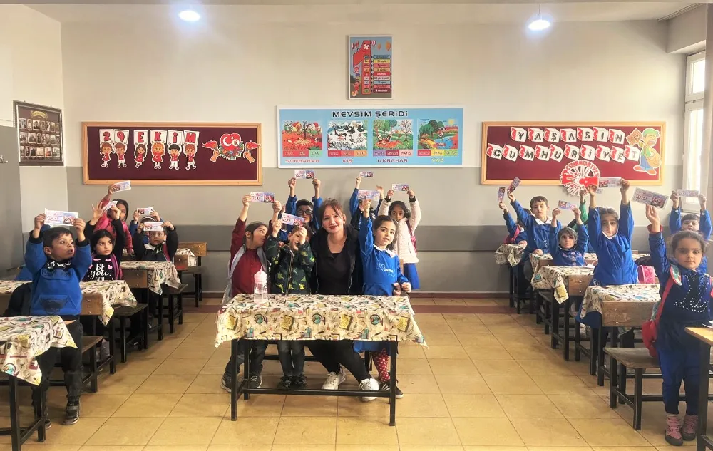 DİCLE ELEKTRİK SİİRTLİ ÖĞRENCİLERE KİTAP ÇEKİ DAĞITTI